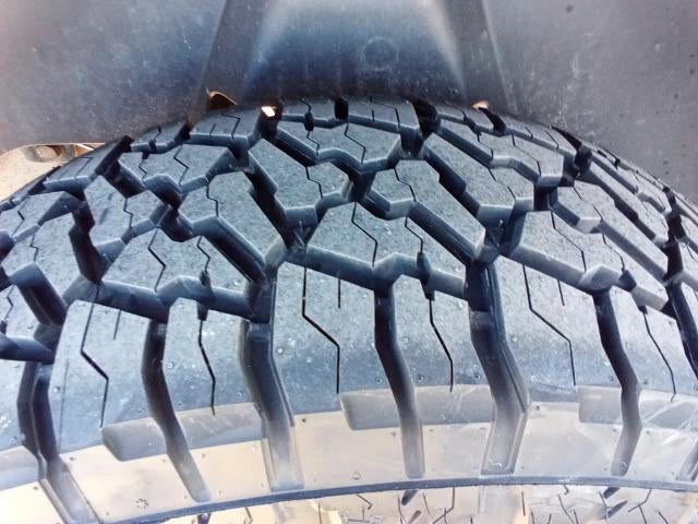 2015 RAM 1500 4WD Quad Cab 6.4 Ft Box SLT