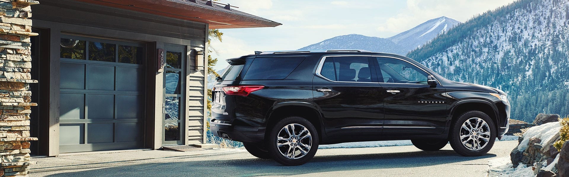 Chevrolet Traverse with a mountain backdrop