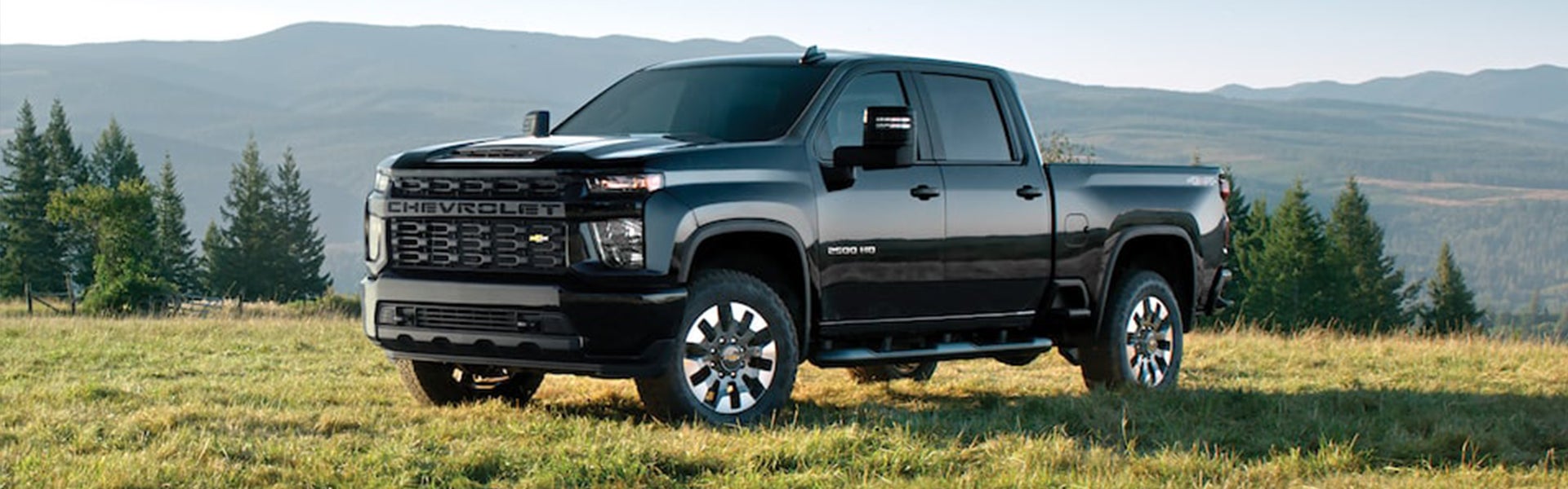 Side view of a Chevrolet Silverado 2500HD, showcasing its rugged design and powerful stance